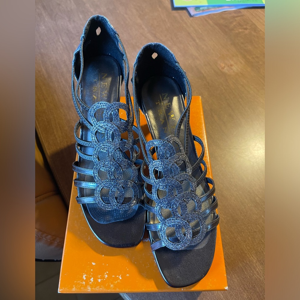Silver/ Pewter dress shoes. Worn once to sit at a wedding. Practically new.